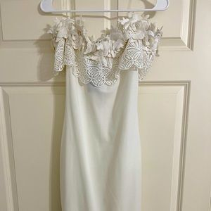 Brand new white strapless dress. Size medium.
